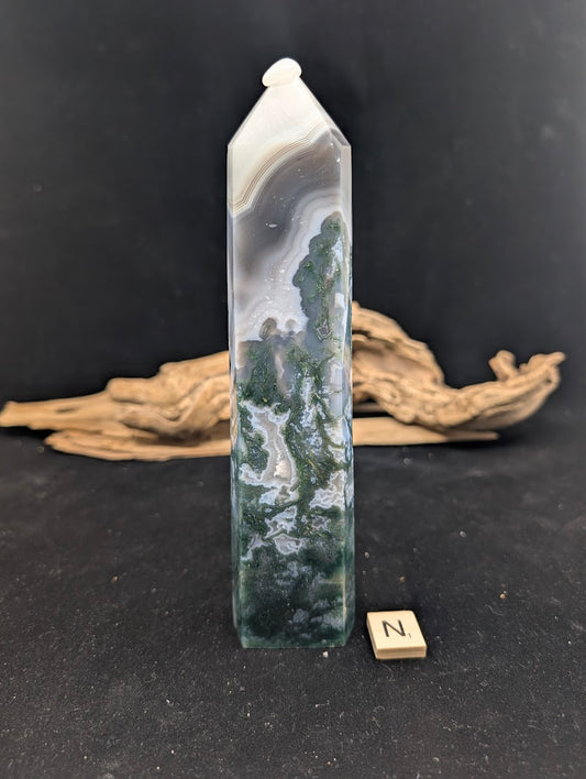 Front view of Variant N Moss Agate tower with high-contrast snow-capped fortification banding.