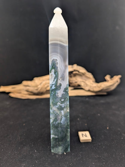 Side view 2 view of Variant N Moss Agate tower with high-contrast snow-capped fortification banding.