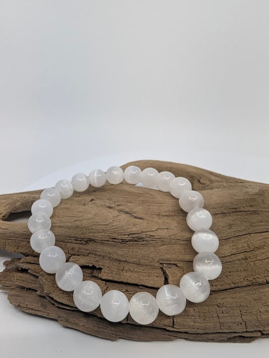 8MM Selenite bracelet displayed on wood background