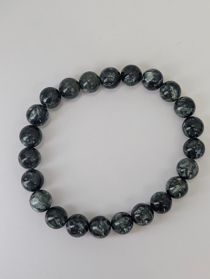6 mm Seraphinite bracelet with deep green color and fine polish