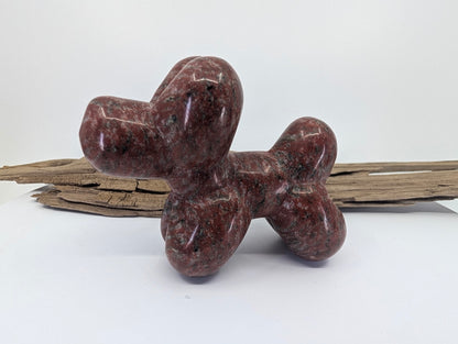 Red Sesame Jade (Granite) balloon dog specimen E with characteristic black and grey speckles.