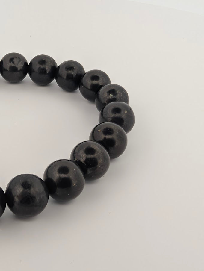 Top view of 8MM Shungite bracelet in a full circle