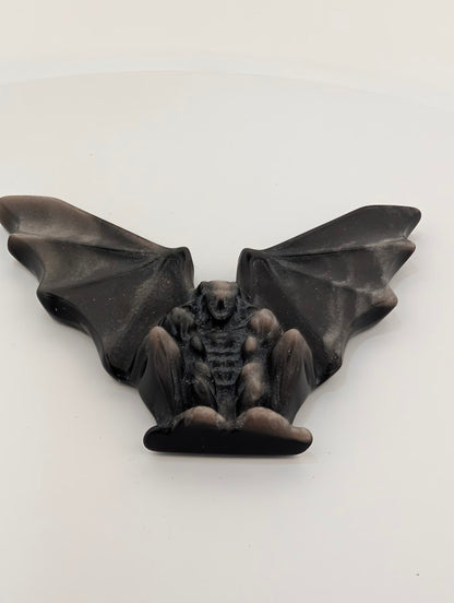 Silver obsidian gargoyle carving – angled view showing wings and body