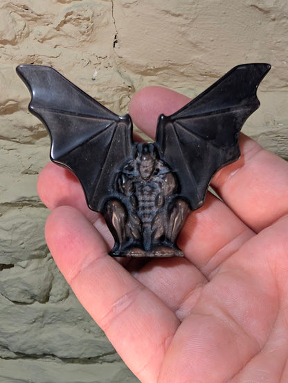 Silver obsidian gargoyle carving – front view in hand showing size and detail