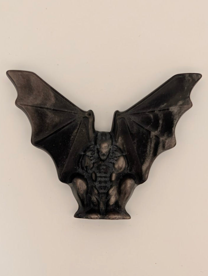 Silver obsidian gargoyle carving – top view showing wings and body