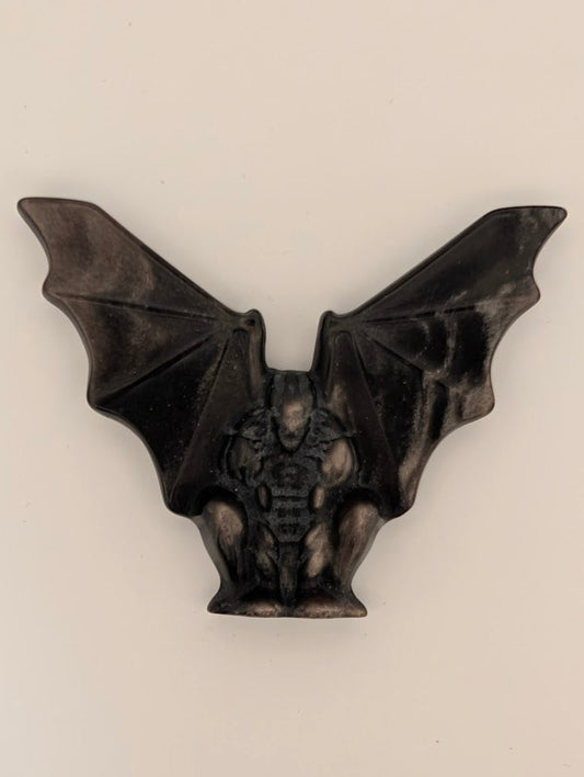 Silver obsidian gargoyle carving – top view showing wings and body