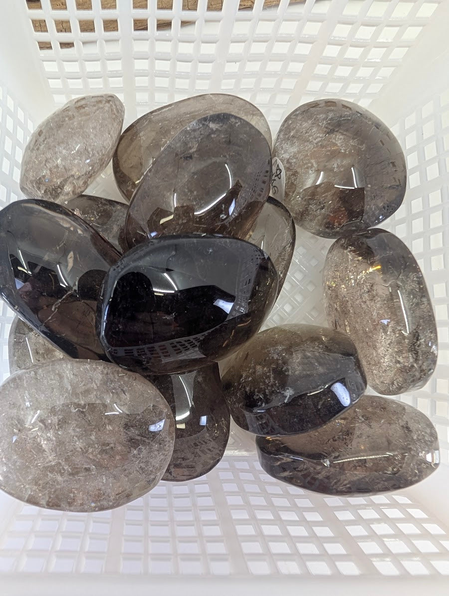 Batch of Lwena Citrine stones demonstrating the natural range of honey and smoky tones.