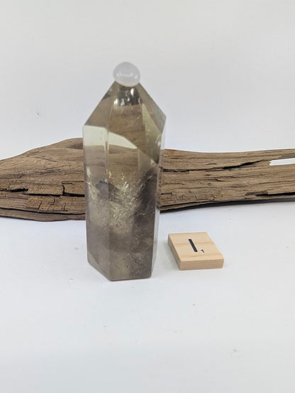 Polished Smoky Citrine tower Piece I from Brazil, 75mm tall, in a standing display.