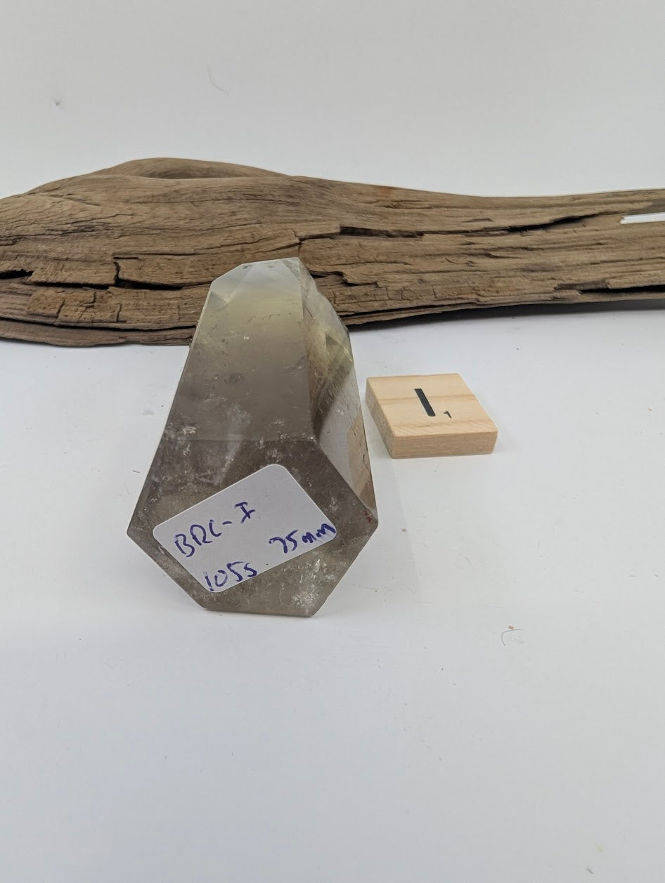 Polished Smoky Citrine tower Piece I from Brazil showing its 105g and 75mm measurement label.