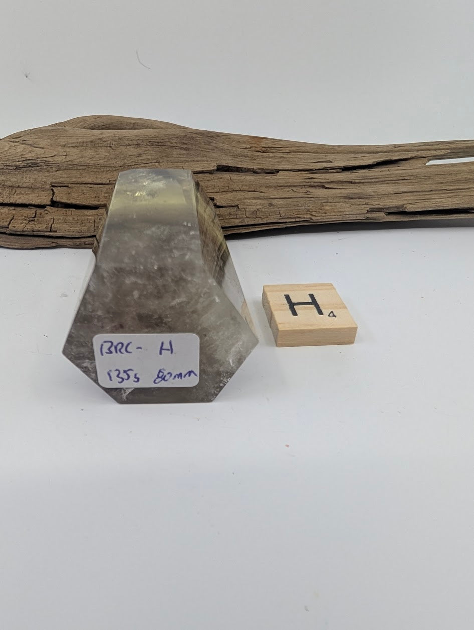 Polished Smoky Citrine tower Piece H from Brazil showing its 135g and 80mm measurement label.