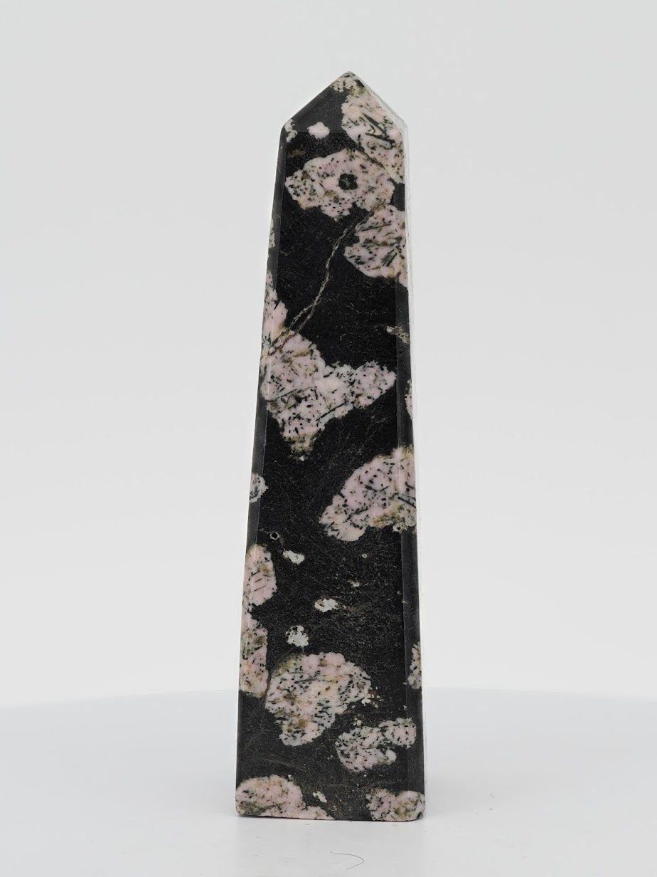 Polished Snowflake Obsidian tower from Pakistan featuring dense grey and pinkish cristobalite snowflake patterns.