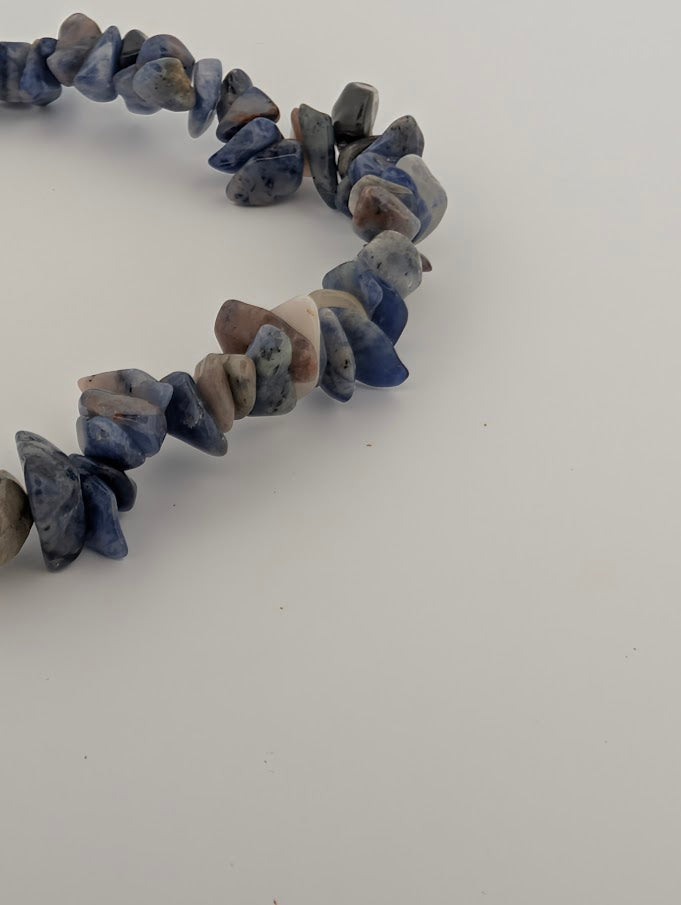 Close-up of sodalite chip bracelet highlighting raw, organic crystal pieces