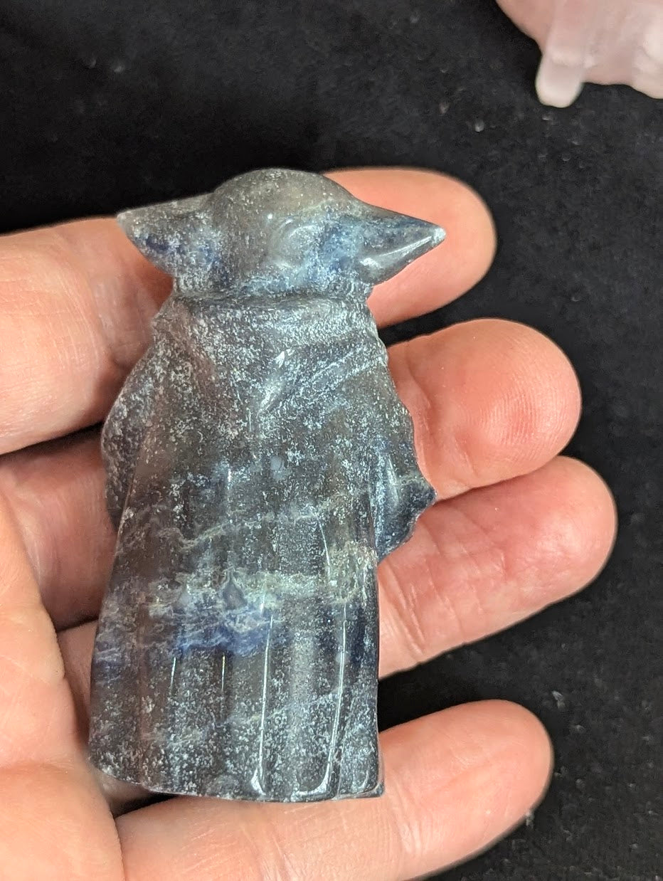 Back view of a Sodalite Yoda carving showing the natural mineral pattern and polished finish.