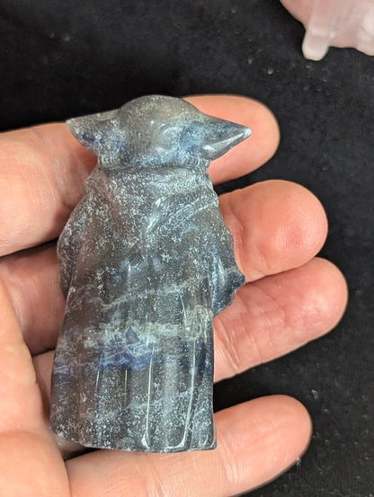 Back view of a Sodalite Yoda carving showing the natural mineral pattern and polished finish.