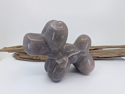 Lilac-pink Strawberry Quartz balloon dog specimen F with a fine crystalline shimmering texture.