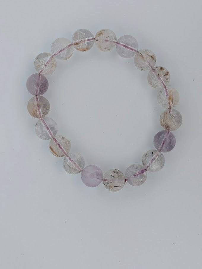 10MM Super Seven bracelet featuring natural polished round beads