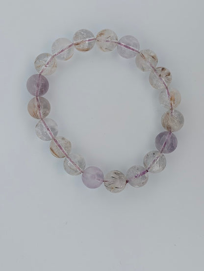 10MM Super Seven bracelet featuring natural polished round beads