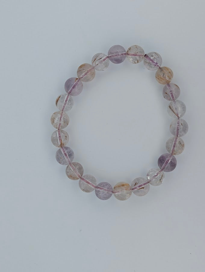 8MM Super Seven bracelet featuring natural polished round beads