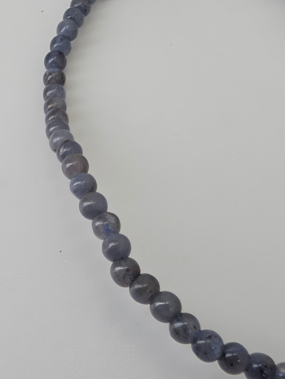 Premium polished tanzanite bracelet with 3mm round beads and vivid color