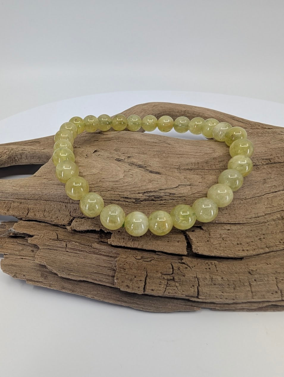 Natural 7mm Tsavorite Garnet bracelet front view showing vibrant green beads