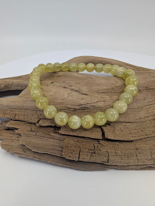 Natural 7mm Tsavorite Garnet bracelet front view showing vibrant green beads