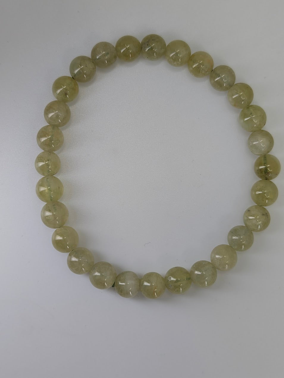 7mm Tsavorite Garnet bracelet on stretch cord with polished round beads