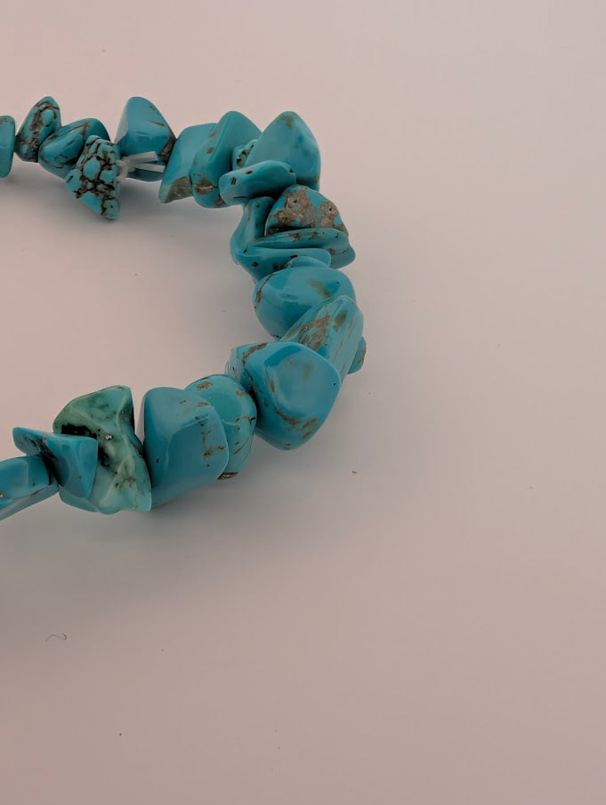 Polished turquoise chip bracelet beads in blue-green tones