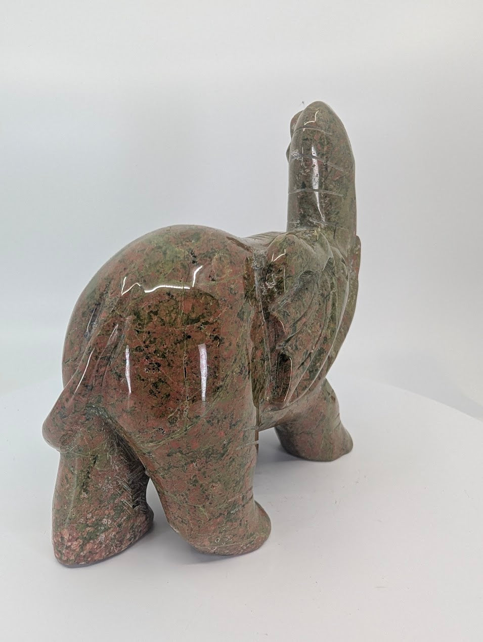 Back angled view of Unakite elephant sculpture