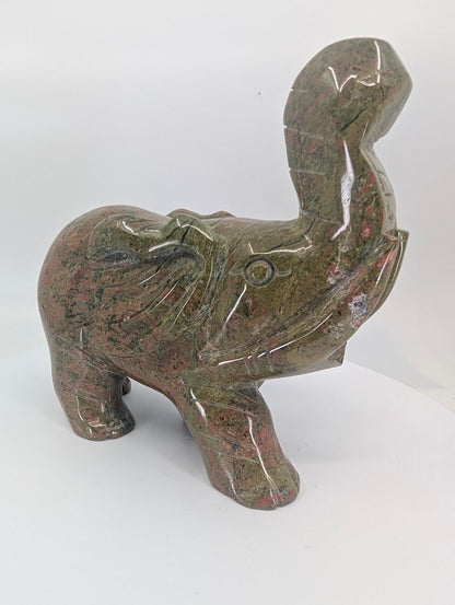 Back view showing Unakite’s pink and green matrix