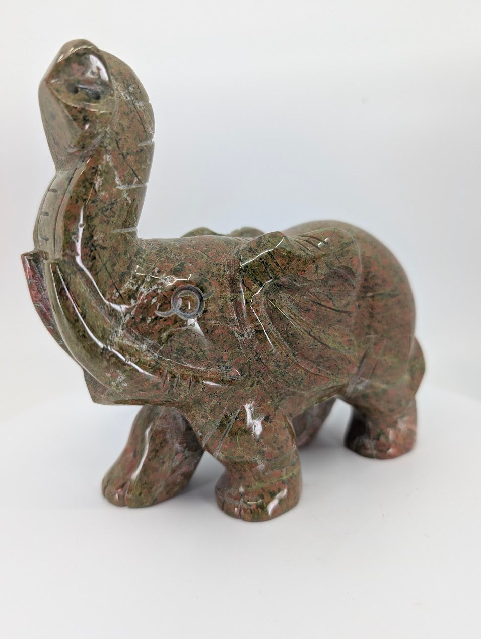 Unakite elephant carving, 1.205 kg, front view