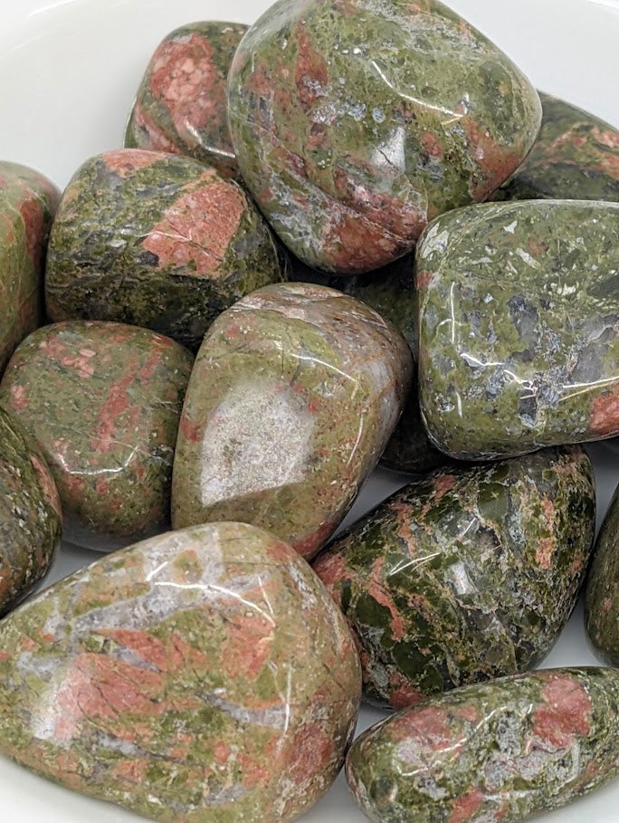 Close-up of Unakite stones highlighting epidote and feldspar mix