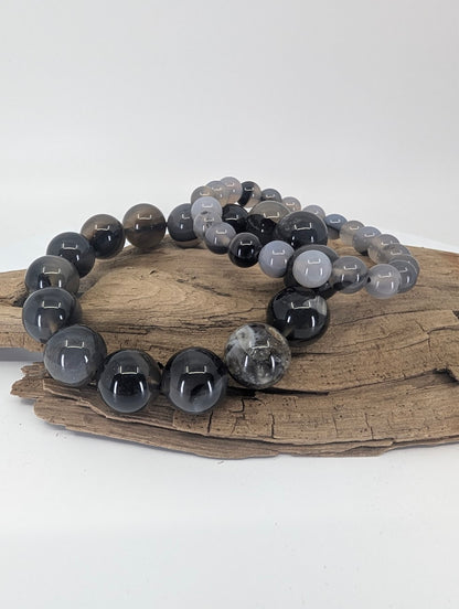 Volcano Agate bracelets in 8mm and 14mm showing natural gray banding