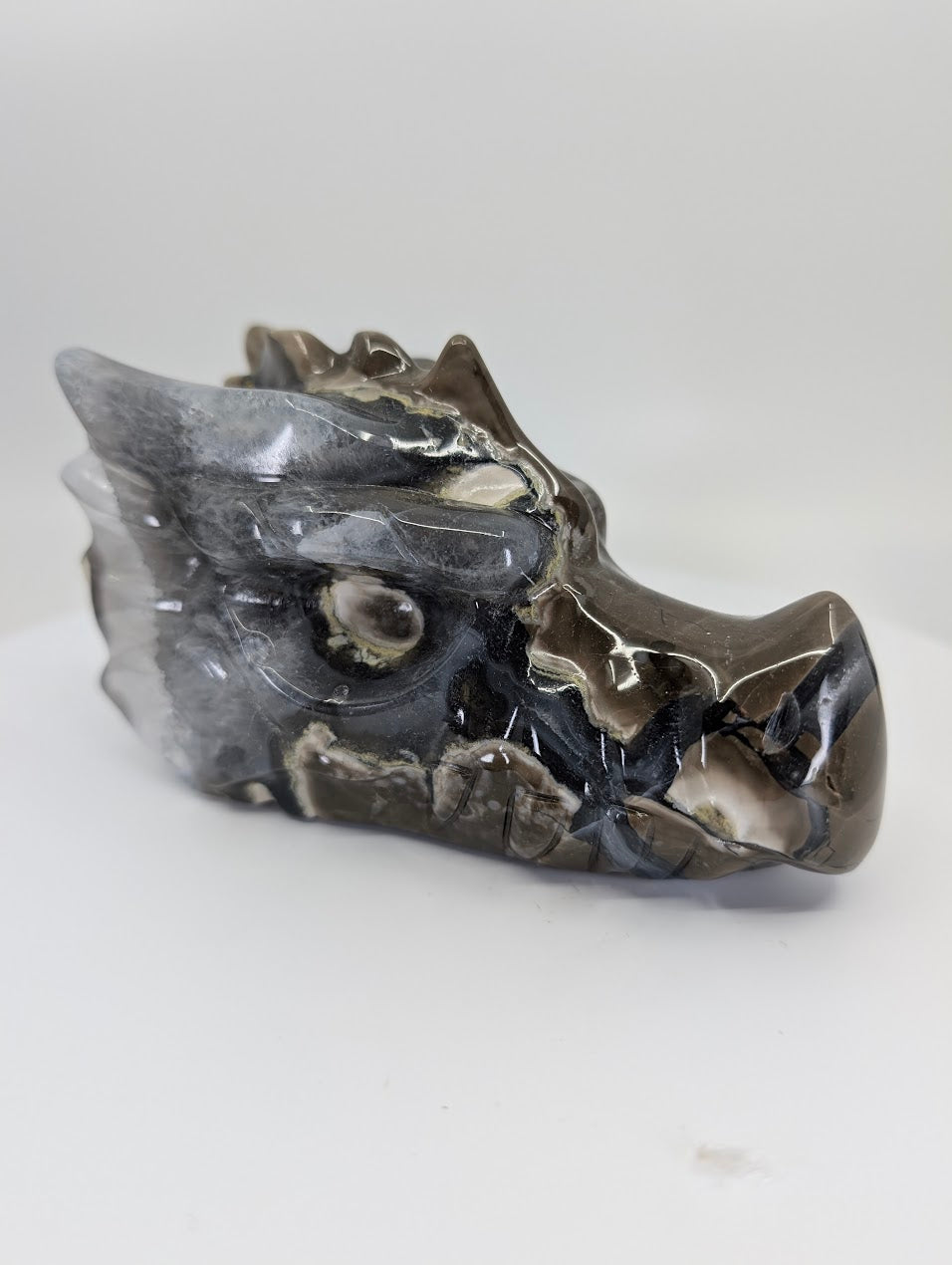 Front-side view of Volcano Agate Dragon Head Variant A, 640g, 13 × 6.5 × 7 cm
