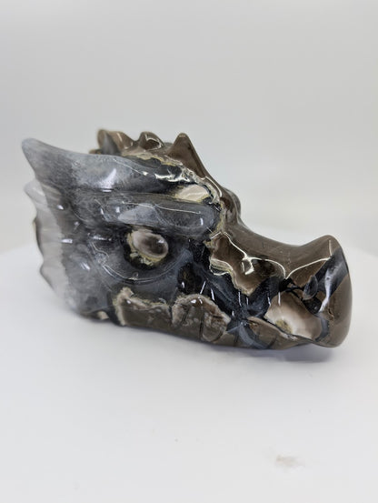 Front-side view of Volcano Agate Dragon Head Variant A, 640g, 13 × 6.5 × 7 cm