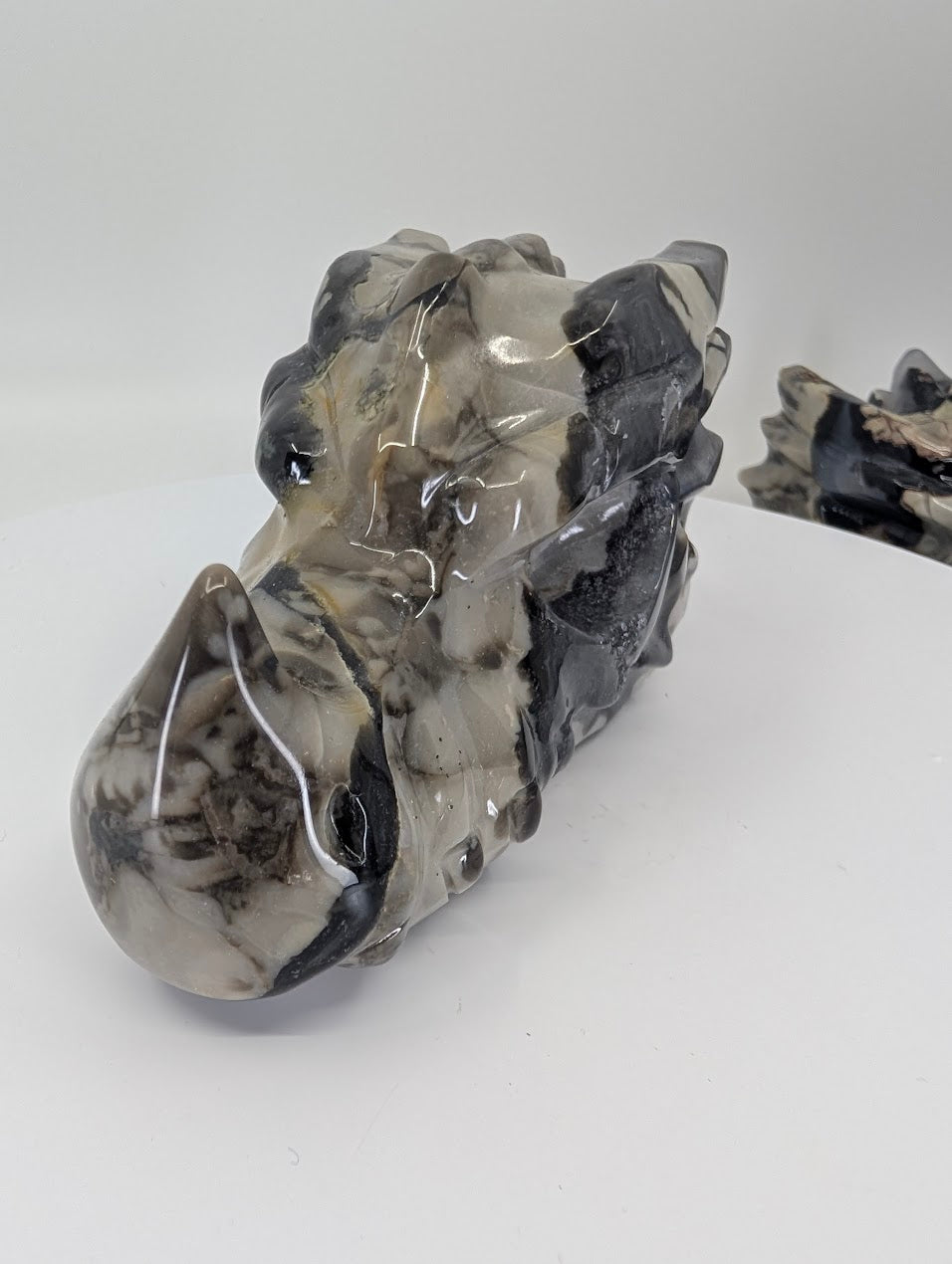 Front-side view of Volcano Agate Dragon Head Variant C, 625g, 13 × 6.5 × 7 cm