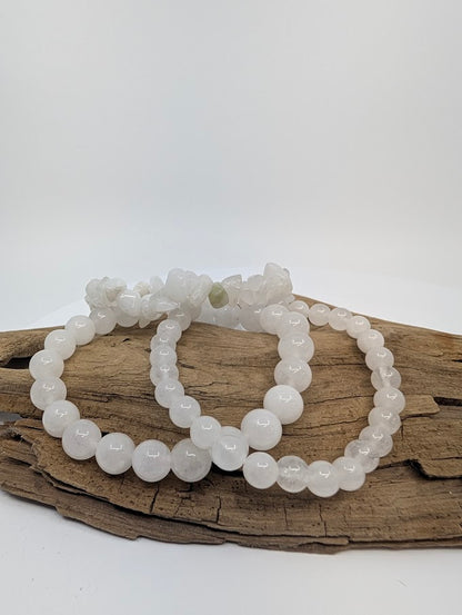 White Jade bracelets in chip, 6MM, and 8MM bead styles displayed together