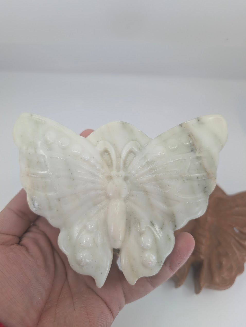 White Jade butterfly carving with smooth white wings