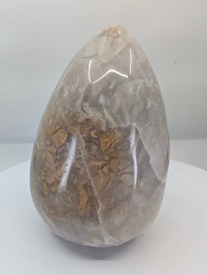 White Mexican lace agate egg approximately 5 inches tall with fine lace banding