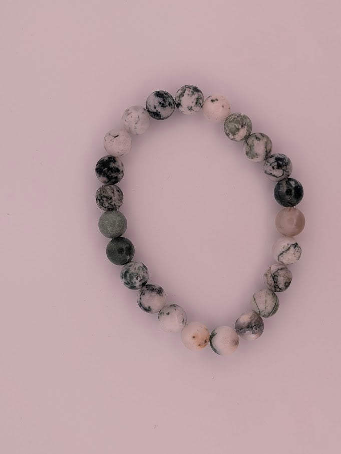 Top view of 8MM White Moss Agate bracelet in circular arrangement