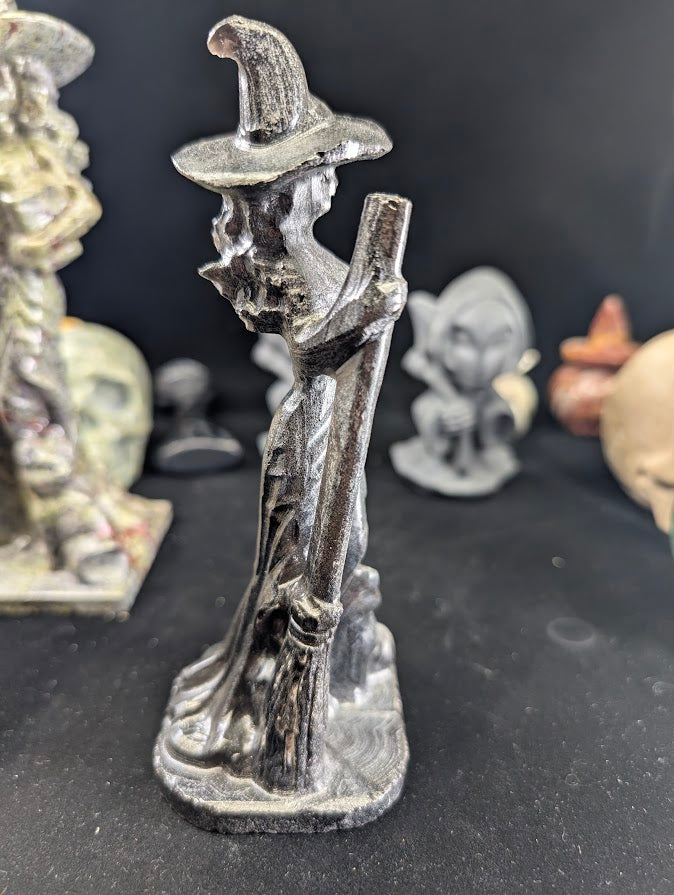 Silver Obsidian Witch Carving – Angled View showing silver sheen
