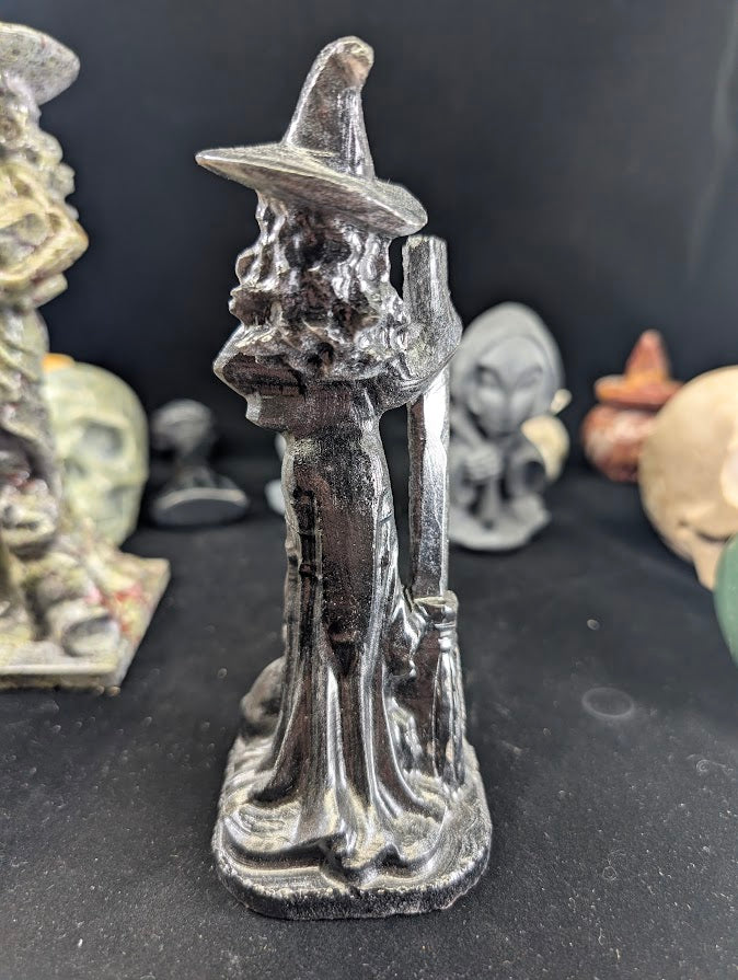 Silver Obsidian Witch Carving – Close-up detail of broom and cat