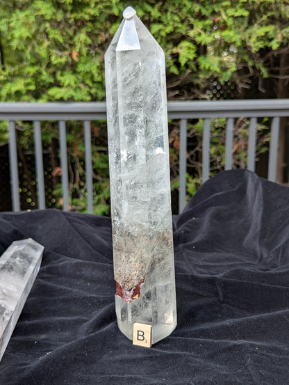 Tower B polished Garden Quartz point showing large earthy garden inclusion near the lower body