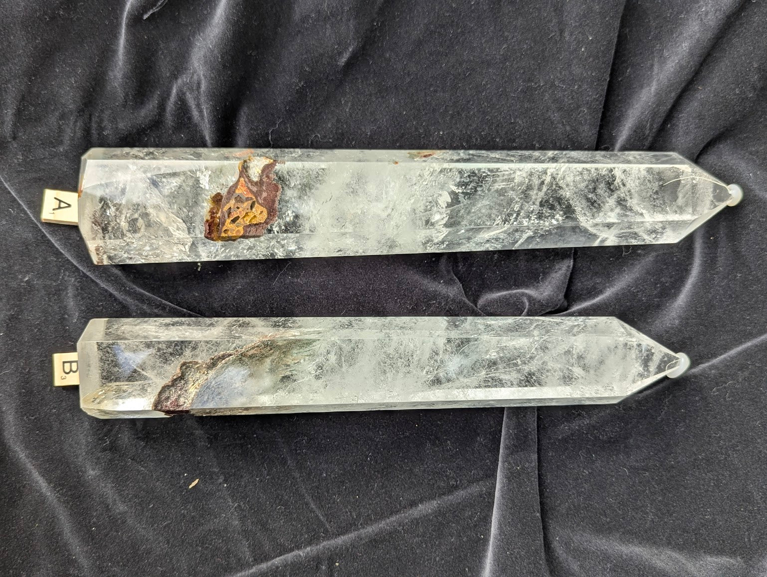 XL Garden Quartz Towers A and B laid side by side showing natural garden inclusions and polished faceted points