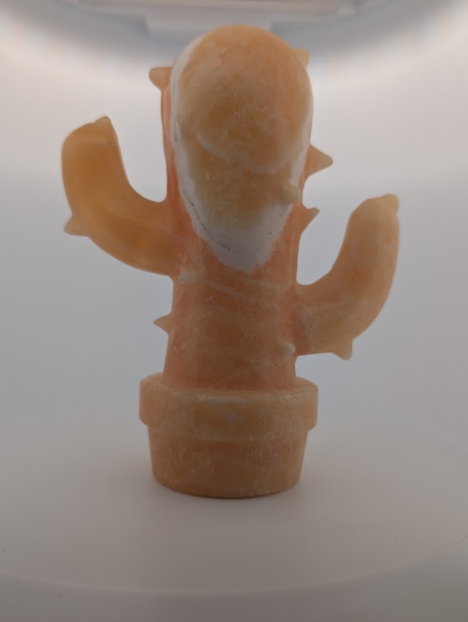 Front view of Yellow Calcite cactus crystal carving, 6 x 4.5 in, 825g