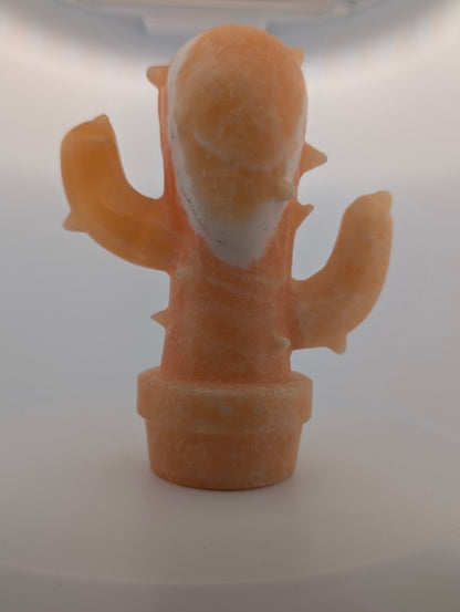 Front view of Yellow Calcite cactus crystal carving, 6 x 4.5 in, 825g