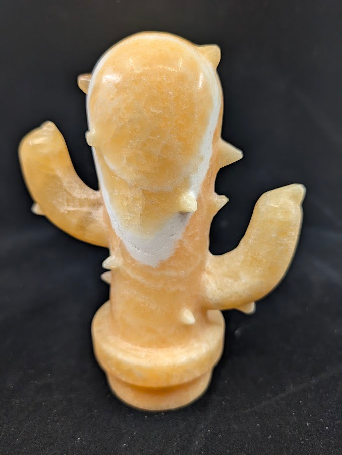 Front view of Yellow Calcite cactus crystal carving, 6 x 4.5 in, 825g