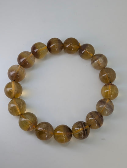 Natural yellow fluorite bracelet on stretch cord with uniform round beads